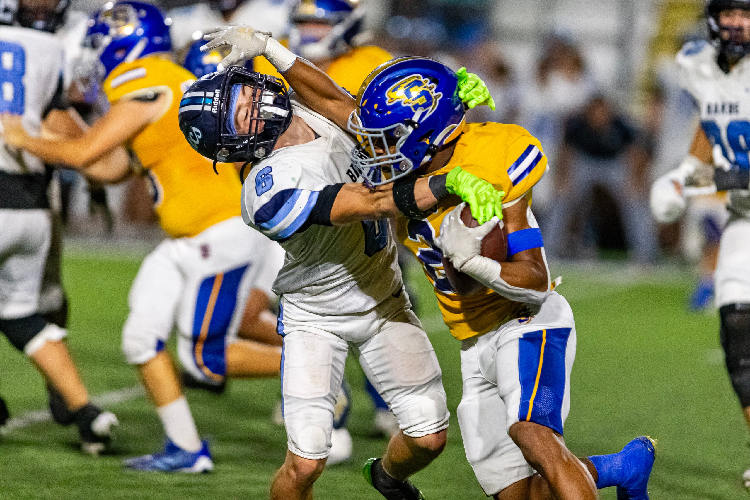 Barbe's Jack Sonnier tackles Sulphur's Tyler Joubert on Friday, Nov. 1, 2024, at Matt Walker Memorial Stadium in Sulphur. (Rodrick Anderson / American Press)