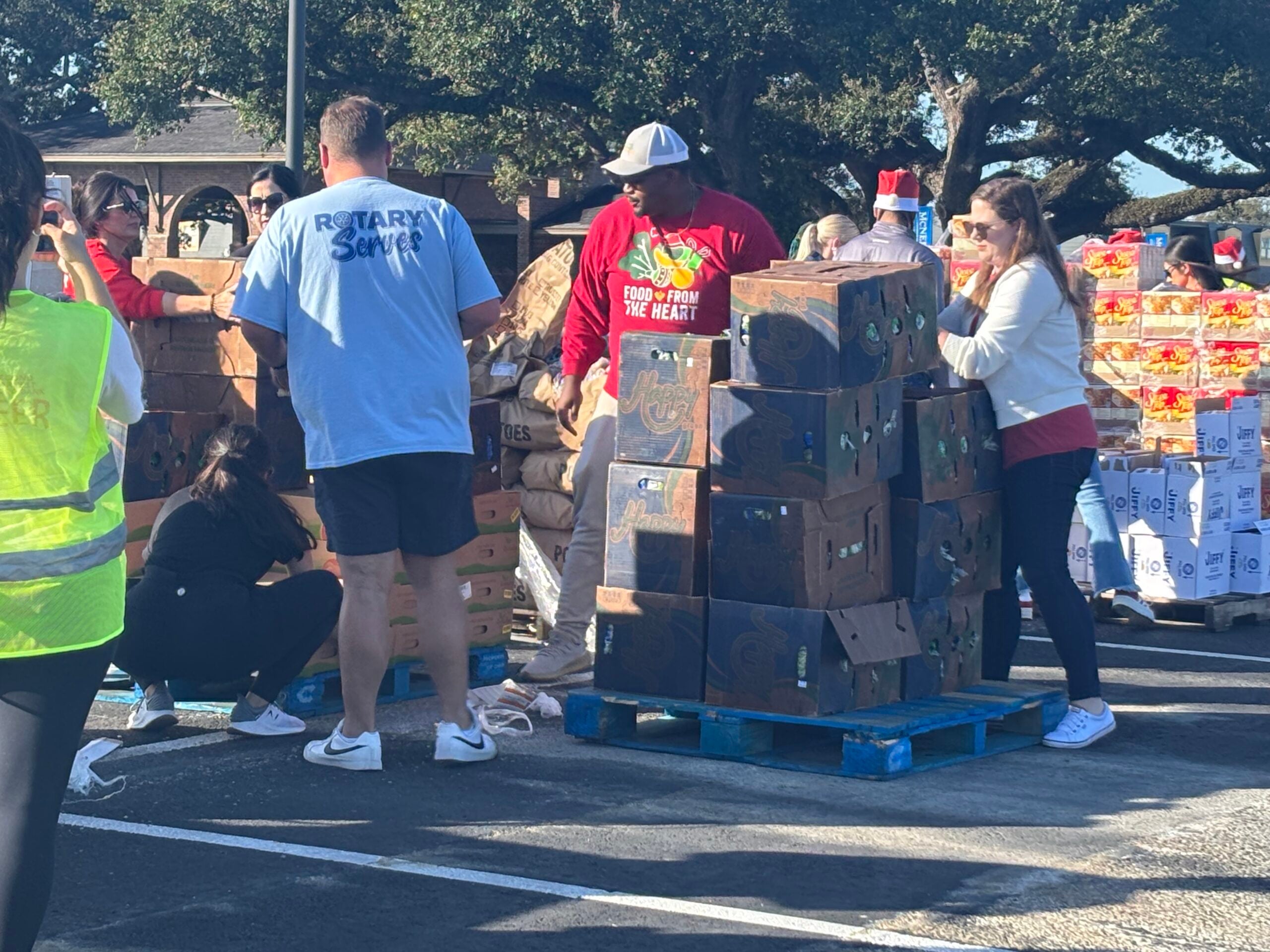 Second Harvest hosts drive-thru Christmas dinner distribution - American Press