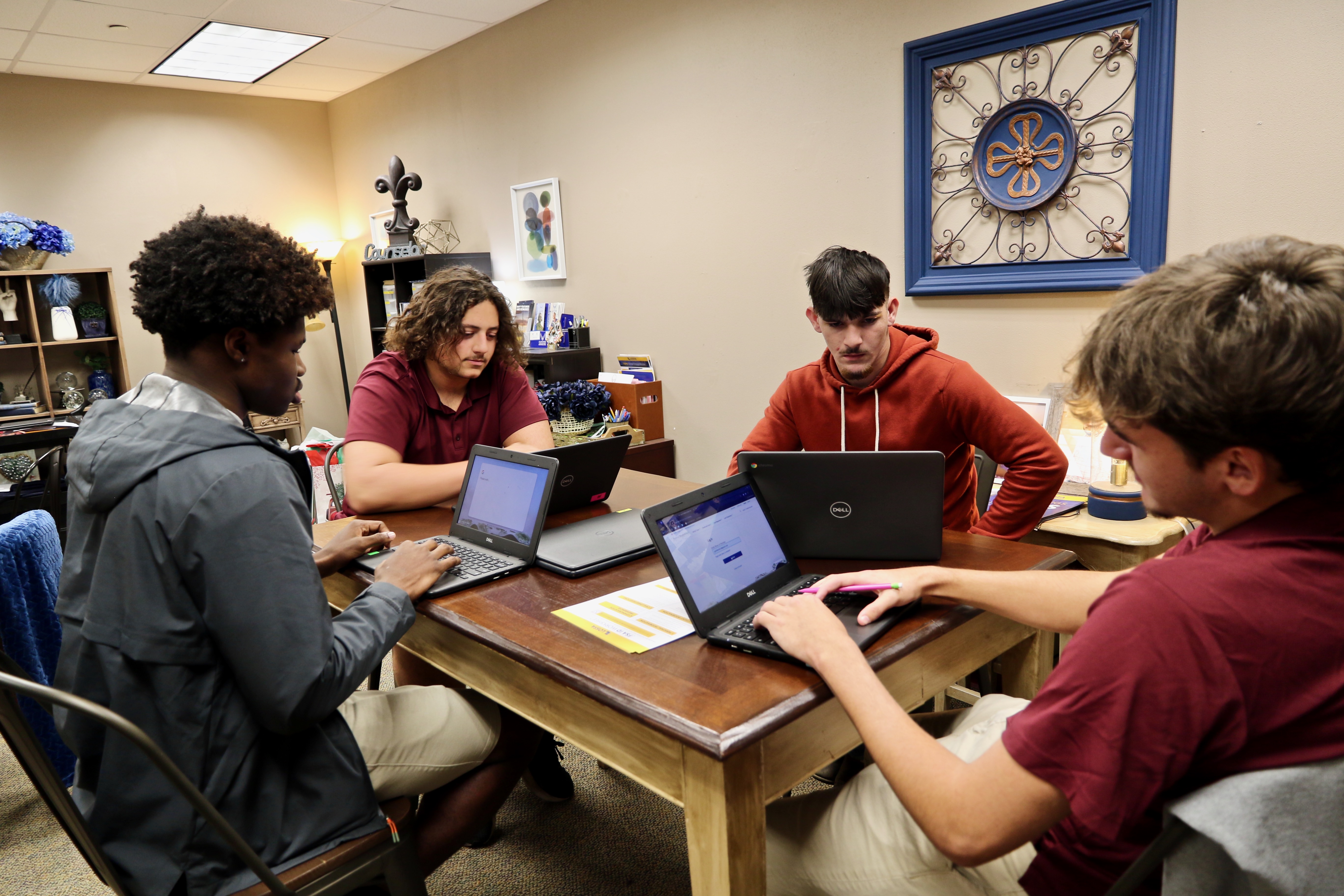 School counselors help students navigate complex college application process